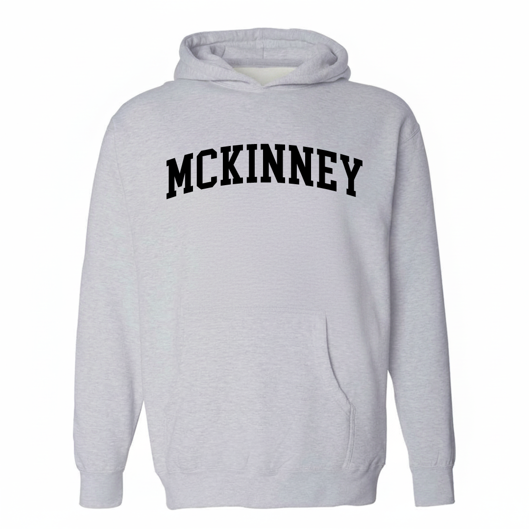 Heather-gray hoodie with the McKinney varsity arched lettering design on the chest.
