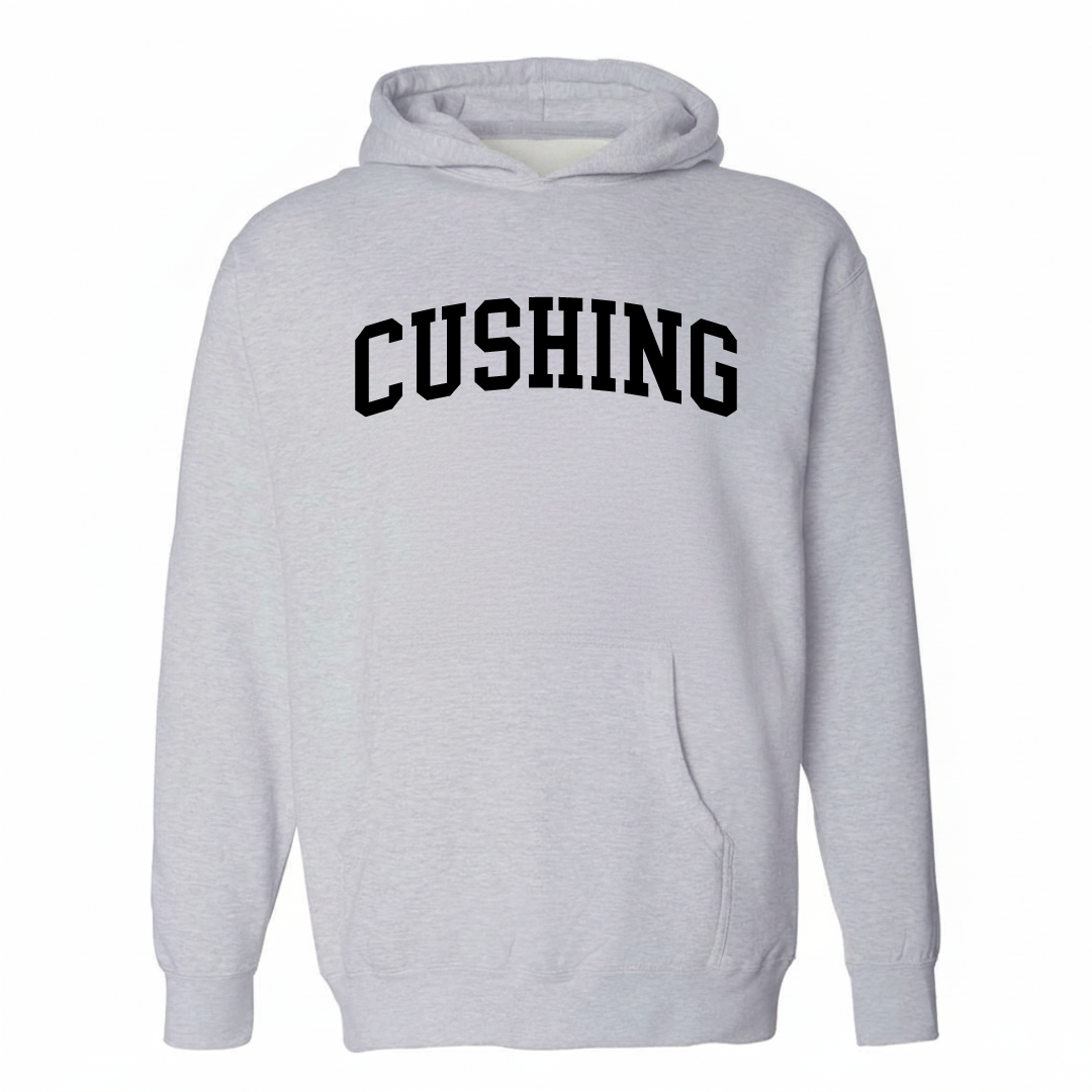 Heather-gray hoodie with the Cushing arched varsity lettering design on the chest.