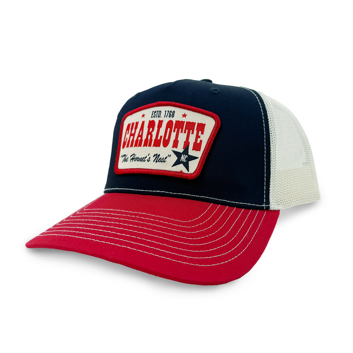 Charlotte Outlaw Trucker Hat