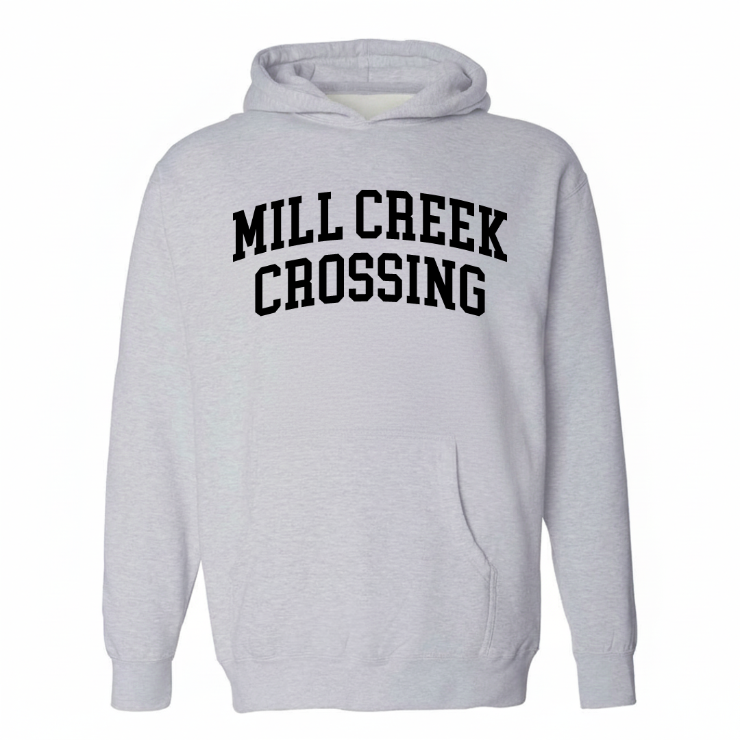Heather-gray hoodie with the Mill Creek Crossing varsity arched lettering design on the chest.